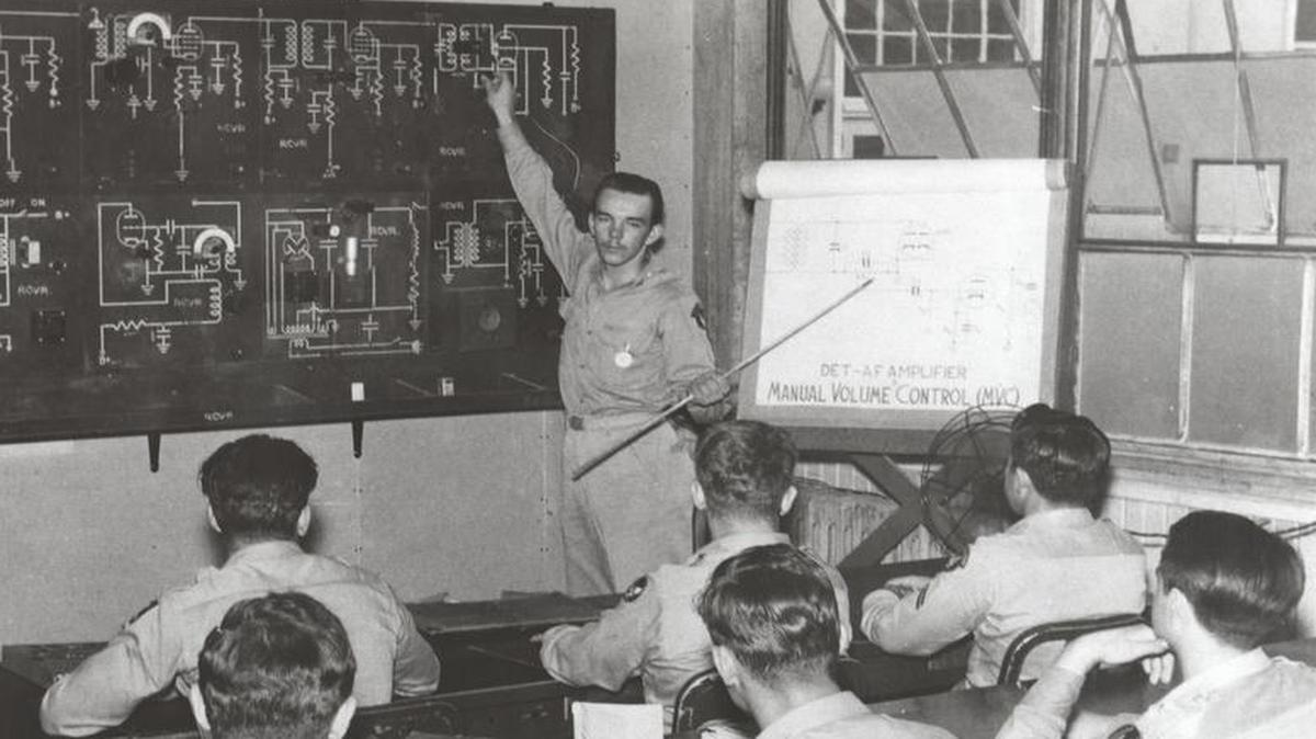 RADIO SCHOOL: Students attend the Radio Fundamentals Course: “How to Tune a Resonant Circuit” in the 1940s. Military personnel from around the world went to the Radio School, including students from Sweden and China. Tech. Sgt. Forrest Vossler, who would later be awarded with the Medal of Honor, and the first Chief Master Sergeant of the Air Force, Paul Airey, graduated from the school.