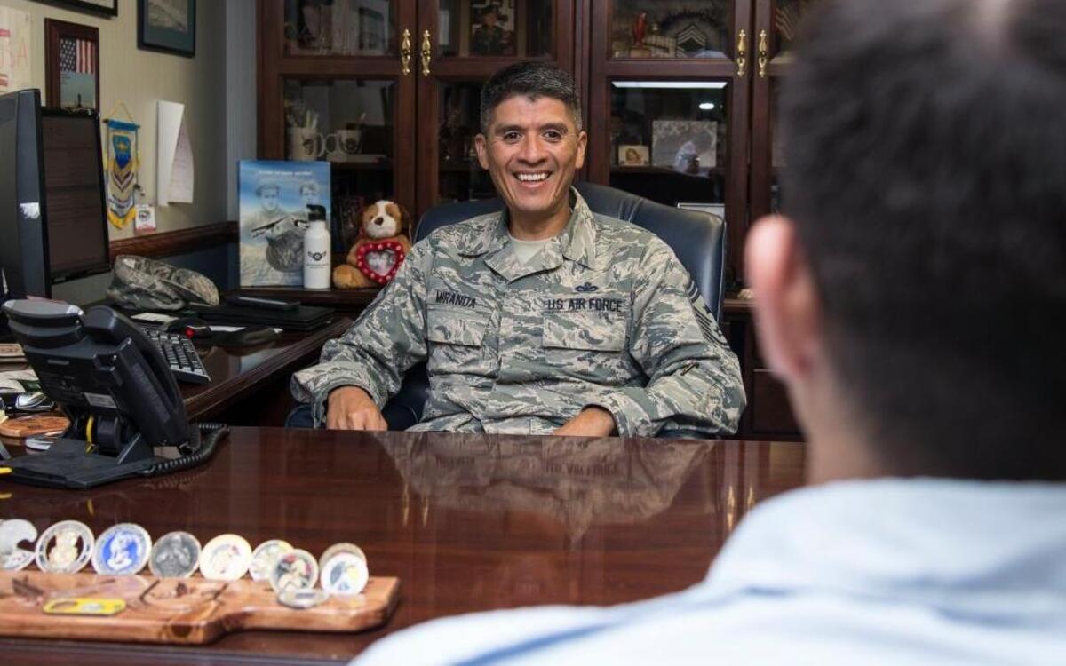 Chief Master Sgt. Benjamin Miranda Jr., 635th Supply Chain Operations Wing, mentors an Airman Oct. 3, 2016, Scott Air Force Base, Ill.