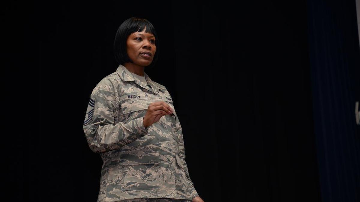Chief Master Sgt. Janna S. Wesley, chief of Diversity and Inclusion for the Air Force, speaks to base members during her visit to Scott on Jan. 10.