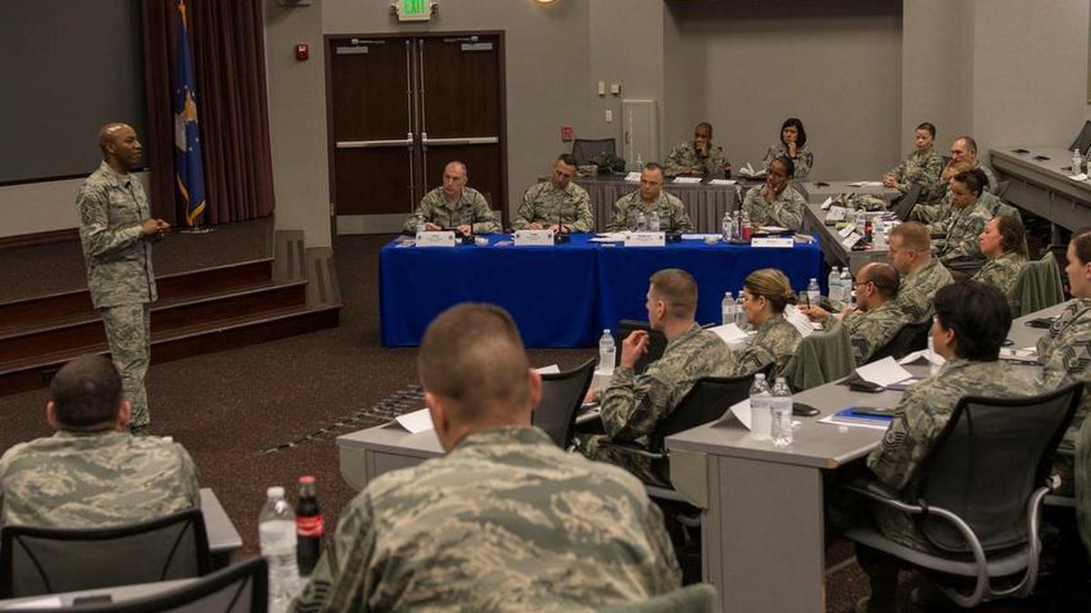 Chief Master Sgt. of the Air Force Kaleth O. Wright speaks to Air Mobility Command Chief Leadership Course attendees Jan. 11 at Scott. Wright and the chief selects discussed balancing the strategic, technical, and leadership roles involved with being a chief master sergeant and what they can expect in the position. Wright and his wife, Tonya, also talked to the spouses about their roles.