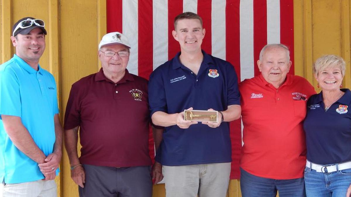 Mascoutah Mayor Jerry Daugherty presented Col. John Howard, 375th Air Mobility Wing commander, a key to the city during last weekend’s 91st Annual Mascoutah Homecoming. Along with receiving a key to the city, Howard served as the grand marshal in Saturday’s parade. Pictured are Cody Hawkins, city administrator; Daugherty; Howard; Harold Knoth, Mascoutah Homecoming Committee chairman; and Howard’s wife, Dana.
