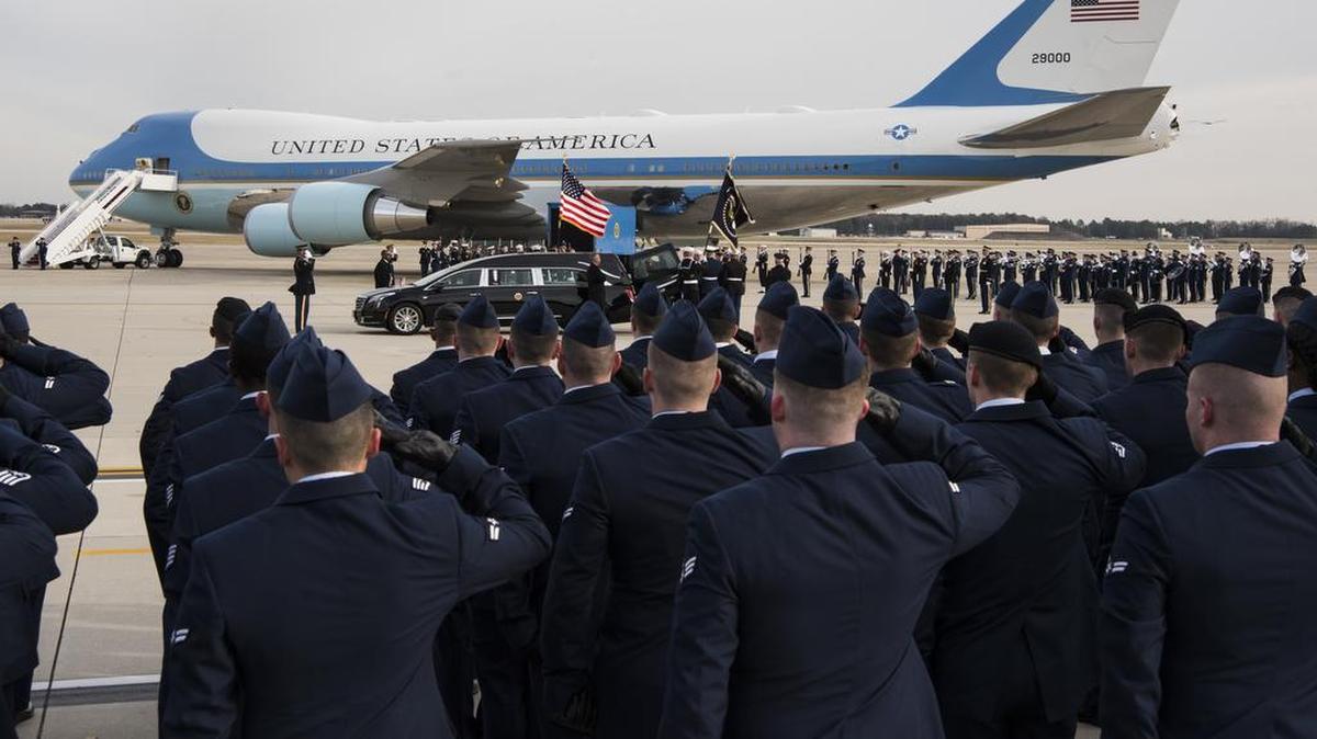 Joint Base Andrews Airmen salute the remains of late President George H.W. Bush on Joint Base Andrews, Maryland, Dec. 5. Nearly 4,000 military and civilian personnel from across all branches of the U.S. armed forces, including Reserve and National Guard components, provided ceremonial support during George H.W. Bush’s state funeral. Photo by Airman 1st Class Michael S. Murphy