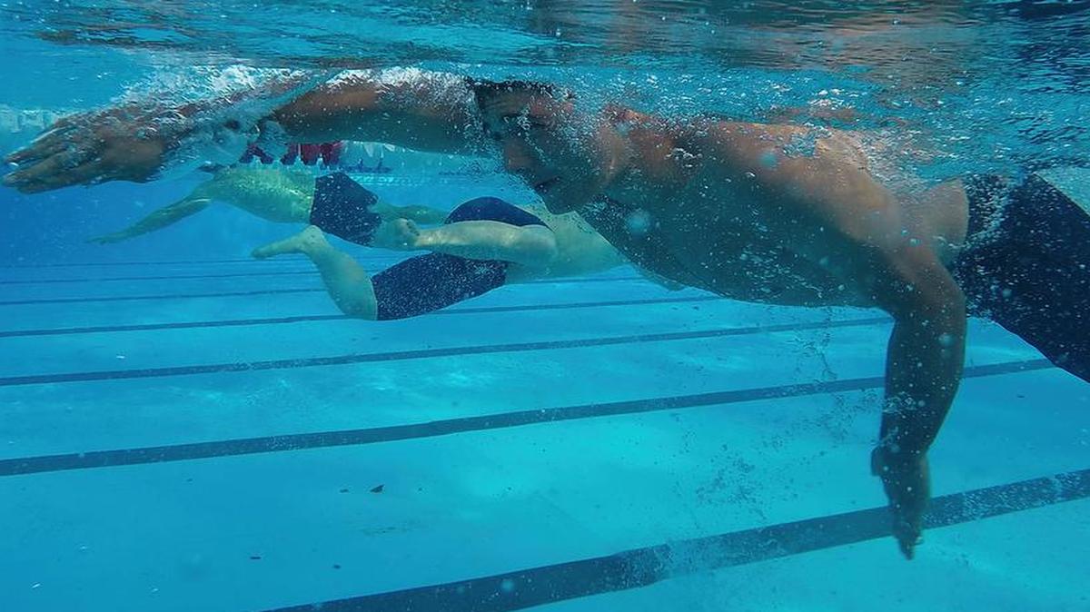 Team Scott members complete the 300 meter swim.