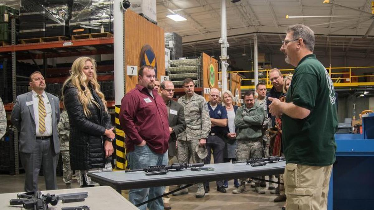 Honorary commanders receive a briefing about weapon safety during Honorary Commander Day at Scott. These Honorary Commanders will serve for one year, with an option to renew their term for an additional year of service.