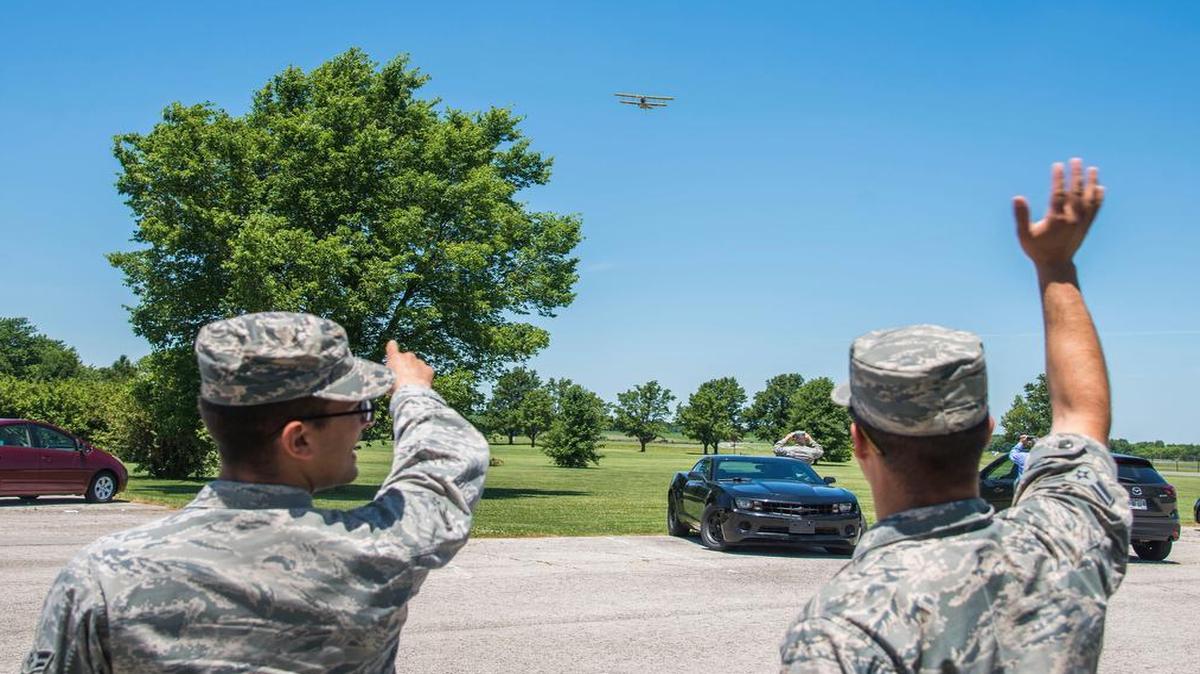 Members of Team Scott gathered around outside of Warrior Park to watch the Curtiss JN-4 “Jenny” aircraft perform a flyover June 20 at Scott AFB. The Jenny was at Scott for the Centennial Airshow and is possibly North America’s most famous World War I aircraft.