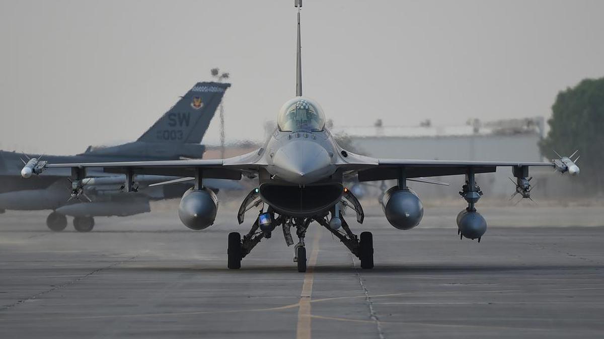 A pilot from the 55th Expeditionary Fighter Squadron taxis an F-16 Fighting Falcon at an undisclosed location in Southwest Asia in October. Airmen from the 20th Fighter Wing at Shaw Air Force Base, South Carolina deployed to the 407th Air Expeditionary Group in support of Operation Inherent Resolve. Photo by Staff Sgt. Dana J. Cable