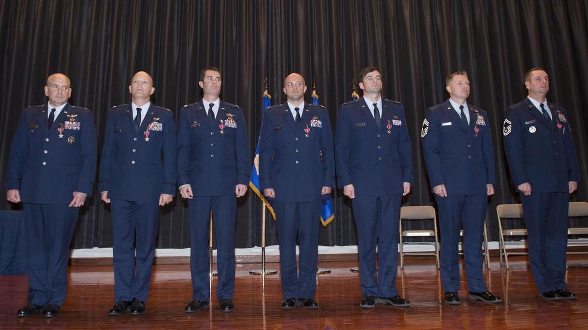 Col. Rhett Champagne, Lt. Col. Blaine Baker, Lt. Col. Robert Rayner, Maj. Jacob Becker, Capt. Andrew Schnell, Chief Master Sgt. Ricky Smith and Senior Master Sgt. Christopher Wright stand during a Bronze Star Medal presentation ceremony at Joint Base McGuire-Dix-Lakehurst, N.J. During their recent deployments in support of Operation Inherent Resolve in Iraq and Northern Syria, the Airmen led Air Base Opening operations that enabled coalition forces to maintain and extend the range and persistence of counter-Islamic State group operations that sustained coalition forces conducting offensives that led to the elimination of IS in key regions and territories.
