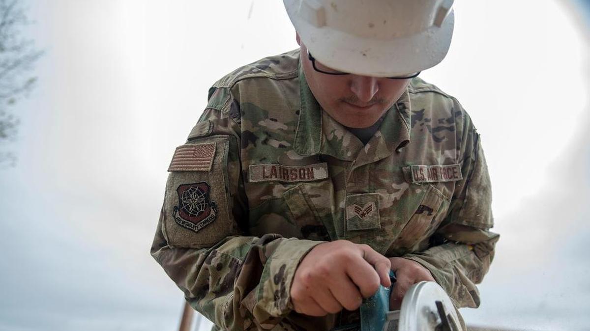 Senior Airman Jesse Lairson, a member of Task Force Phoenix, uses a circular saw to cut plywood Nov. 24 at Tyndall Air Force Base, Florida. Tyndall’s Task Force Phoenix is responsible for large-scale clean up and reconstruction after Hurricane Michael ravaged the panhandle of Florida. Lairson is deployed from the 375th Civil Engineer Squadron at Scott Air Force Base.