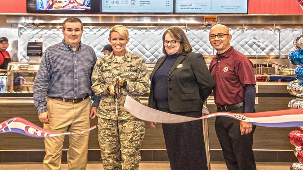Col. Laura Lenderman, 375th Air Mobility Wing commander, cuts the ribbon on the newest addition to the Exchange Food Court—a Panda Express. Also pictured are Dave Couture, AAFES Service Manager; Rita Sheridan, Scott Exchange General Manager; and Kenny Trinh, Panda Express franchise owner.