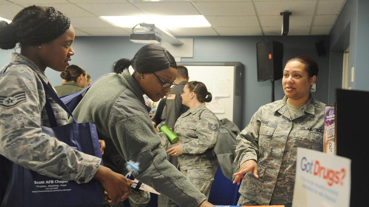 Staff Sgt. Markisha Suggs, 375th Medical Group’s Alcohol Drug Abuse Prevention and Treatment Clinic, talks to Staff Sgt. Keisha Webster, 436th Supply Chain Operations Squadron, and Tech. Sgt. Marquita Brown, 436th SCOS, about drugs and how they can affect them at a women’s resiliency fair held by the Scott Chapel on March 23 at the base chapel. The ADAPT Clinic works with patients dependent on drugs or alcohol and provides information about preventative measures. Representatives from different agencies aimed at helping women with their mental, spiritual, and physical health provided assistance to Team Scott members and raised awareness on issues facing women. Attendees also met with professionals from organizations such as The Lean-In Circle of Scott AFB, Green Dot, Sexual Assault Prevention and Response Office, and 375th Legal Office.