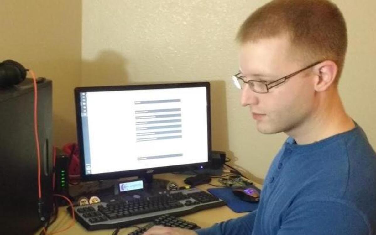Airman 1st Class Matthews Evans, 375th Communications Support Squadron Application Development, sets up a home server for virtualization.