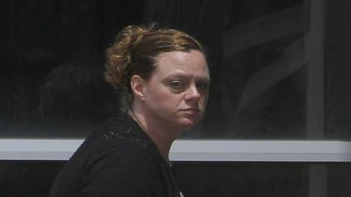 
Keri Knight, a former Edwardsville Police Department dispatcher, walks into the Madison County Criminal Justice Center in Edwardsville on Tuesday.
