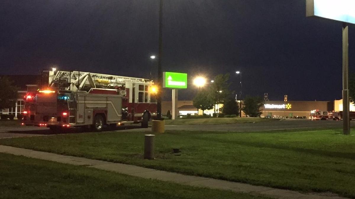 
A fire truck blocks one of the entrances to the Highland Walmart at 12495 Illinois 143 as police investigate a bomb threat there Monday night.
