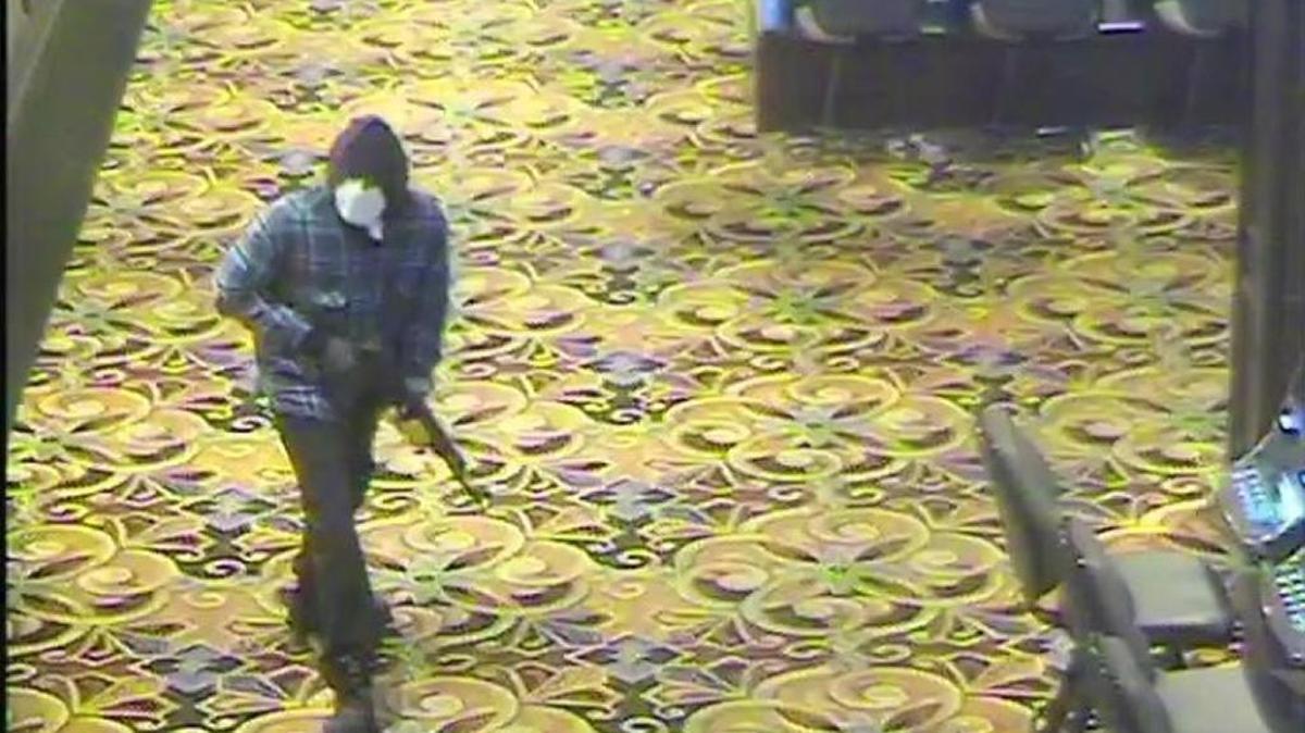 Surveillance images of a masked gunman during an armed robbery of the Casino Queen in East St. Louis Sept. 17, 2017.