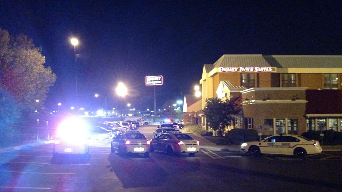 Police stage outside the Fairview Heights Drury Inn & Suites Wednesday night after a person was stabbed.