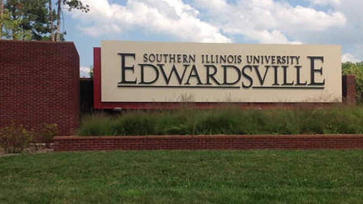 Two men got out of a car on campus and attacked the student, police say.