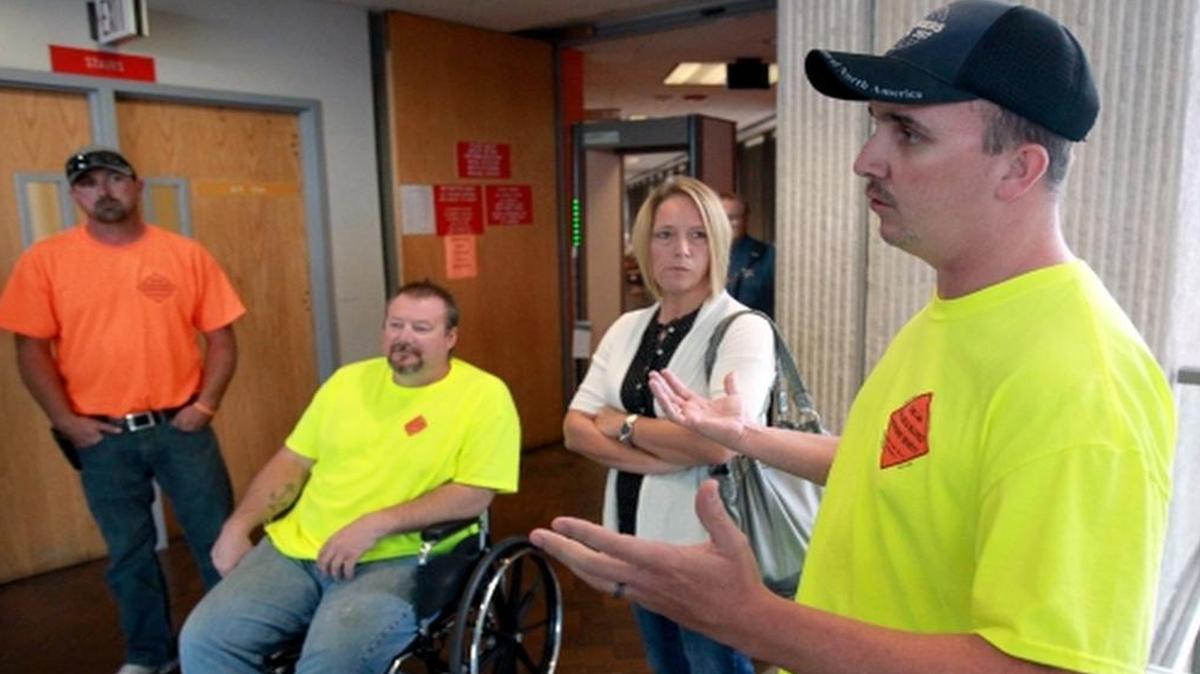 
In this BND file photo, Kory Links (from left), Brian Moore, Josie Beard and Adam Evans talk after a 2012 hearing for Michael Jeter at the St. Clair County Courthouse in Belleville. Links, Moore and Evans were injured by Michael Jeter when working on I-64 in May 2012. Josie Beard’s husband Dennis Beard was killed in the accident. The trial in the wrongful death lawsuit of Dennis Beard is expected to begin this week.
