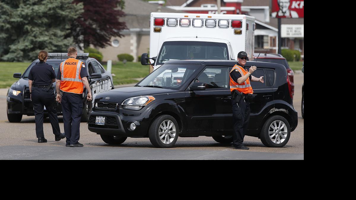 
An ambulance, Belleville Police and a wrecked Kia Sould partially block the intersection of W. Main St. and 48th St. Monday morning in Belleville.
