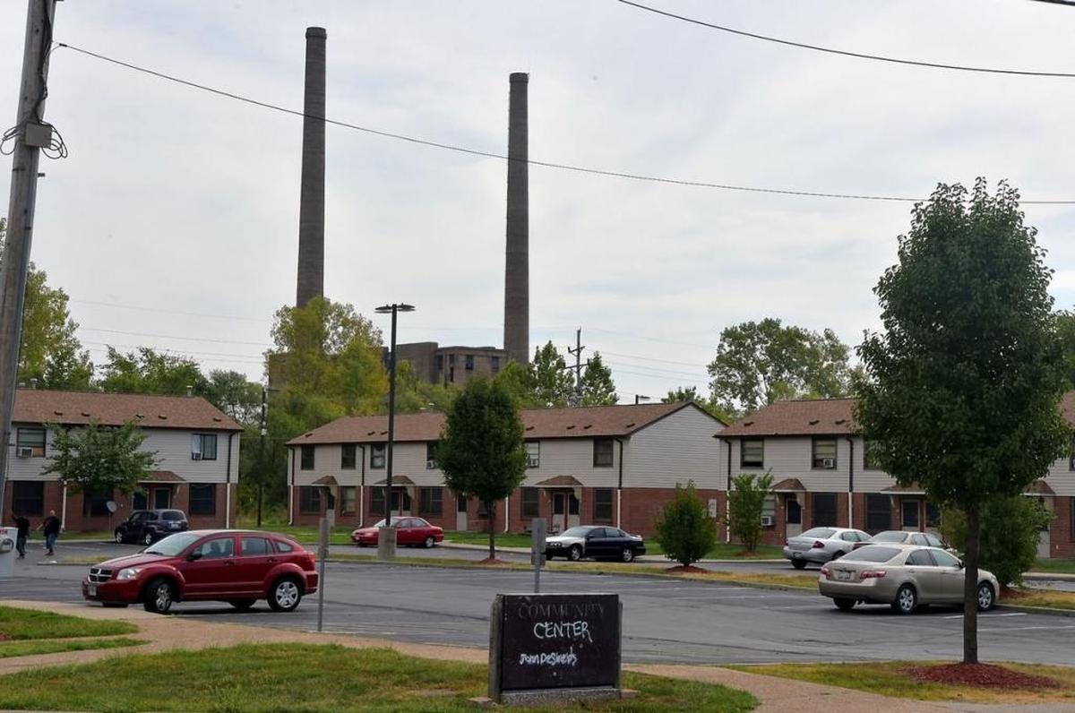 Smokestacks can be seen beyond the housing projects in East St. Louis.