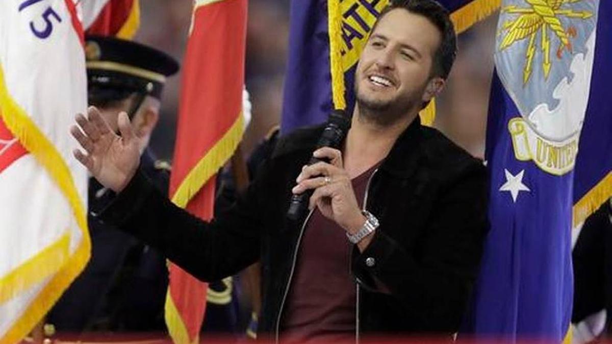 Country music singer Luke Bryan sings the national anthem before Super Bowl 51 on Feb. 5 in Houston. Bryan will perform in St. Louis on June 3.
