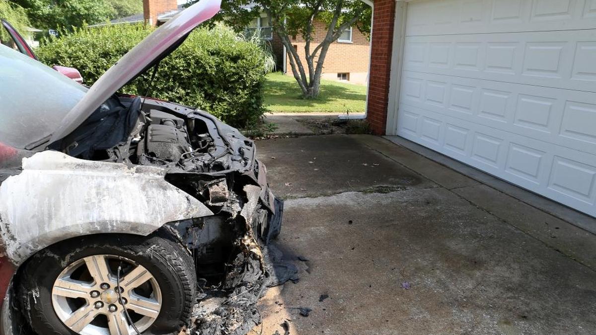 A van parked at a Belleville home caught fire Thursday morning. A neighbor with a garden hose is credited with preventing the fire from spreading to the house.
