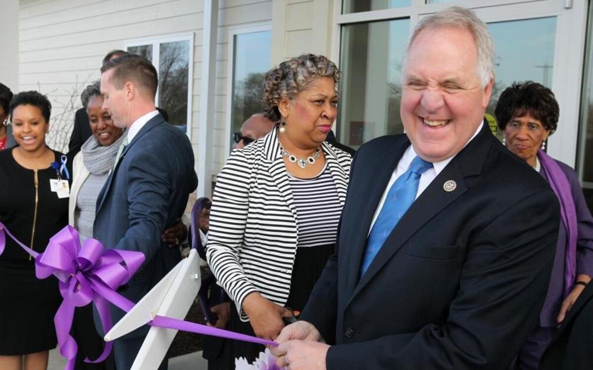 U.S. Congressman John Shimkus shares a laugh with others Monday at the ribbon-cutting ceremony for the new Central Collinsville Health Center.