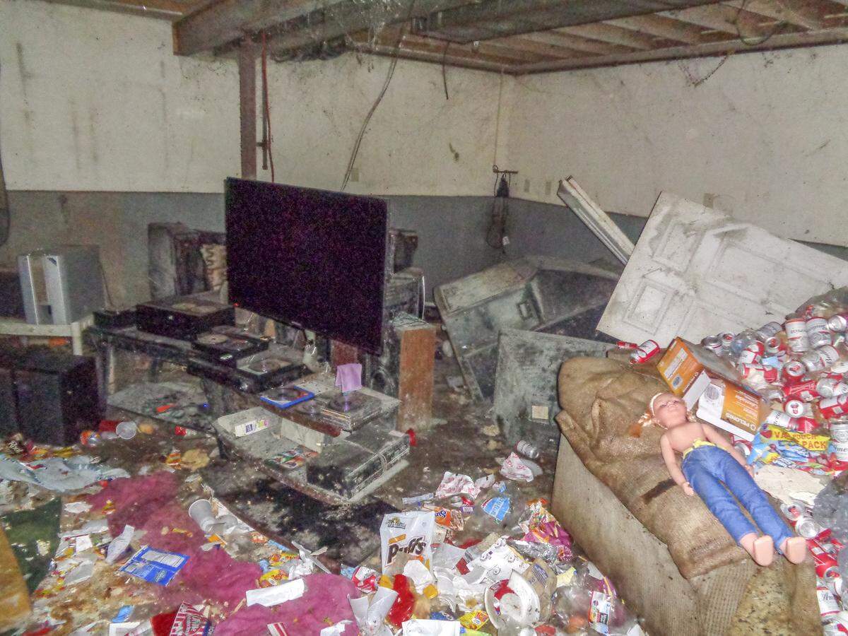 Elkins basement TV trash beer cans