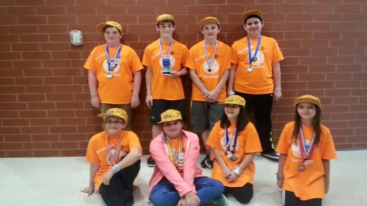 The Robo Waffles were Rob Bucks, Clint Conness, Nathan Cook, Evan Yasitis and (front row) Sarah Schaibly, Paige Yasitis, Mary-Elizabeth Beware and Alexa Bucks.