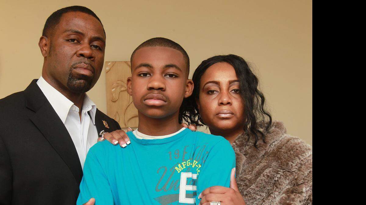 
The Acoff family — Dwayne Acoff II, center, his father Dwayne Acoff, left, and mother Premissa Acoff — fought against racial bullying at Wolf Branch School District 113. 
