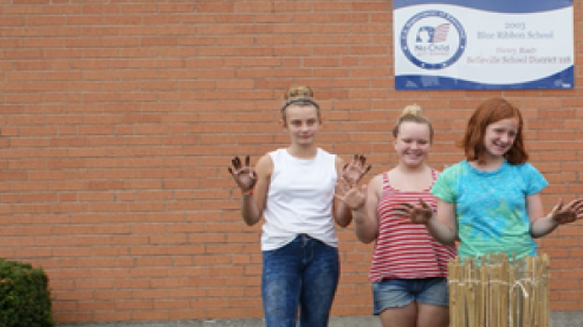 
Elizabeth Herbstritt, left, Morgan Murphy, Stella Stammer, Alyssia Tuttle and Helen Libby helped make a keyhole garden at Henry Raab Elementary in Belleville.
