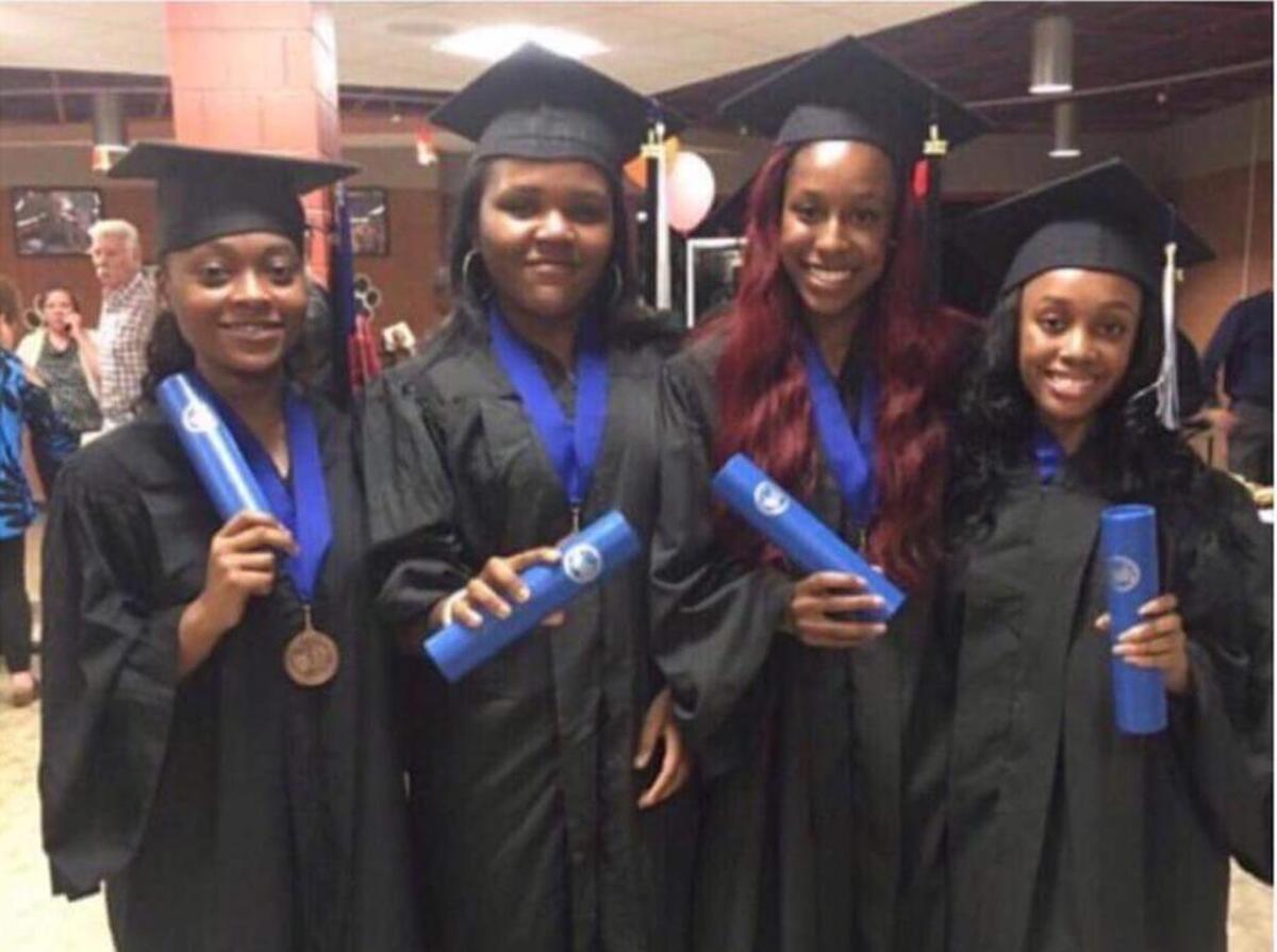 From left to right, Charmalya Smith, Kayla Lee, Nicquayleeonntea Moore and Andriel Weir are pictured at Southwestern Illinois College’s commencement on May 18, 2017.