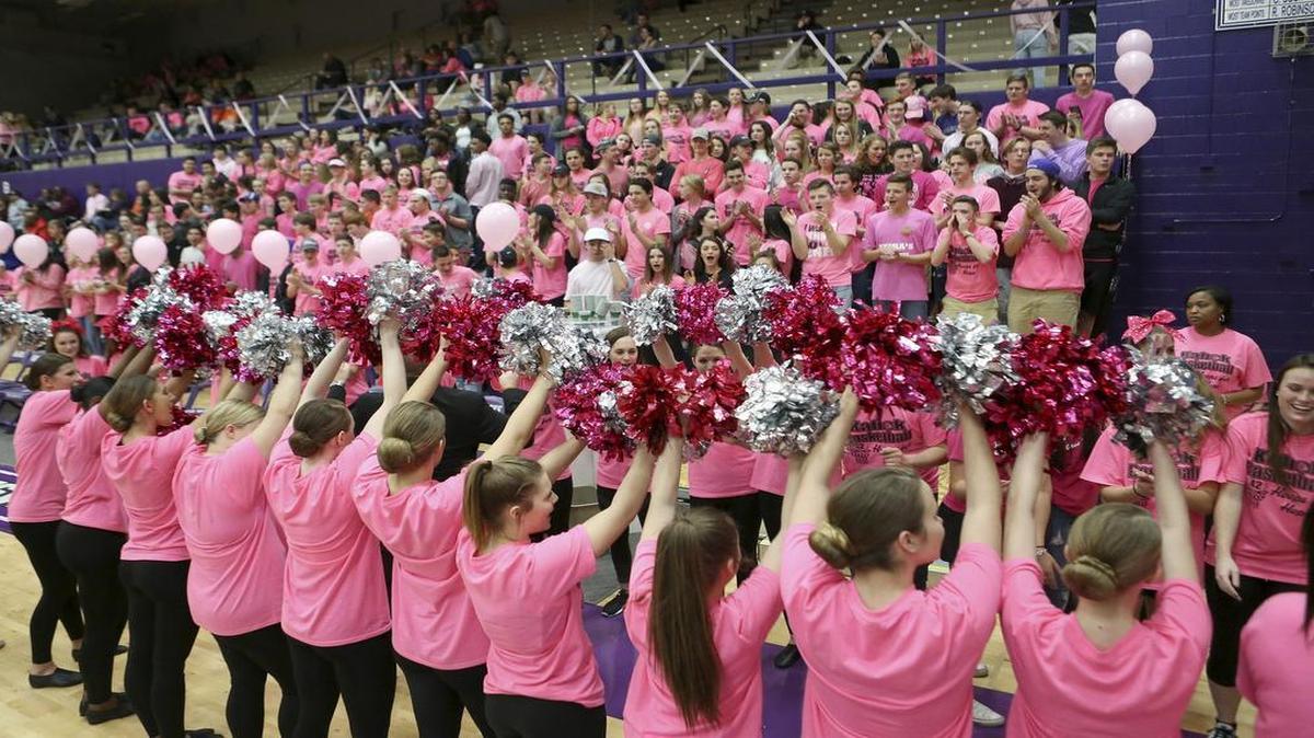 Collinsville High School held a “pink out” night during the game against Belleville West High School on Friday to honor a teacher that has been battling cancer.