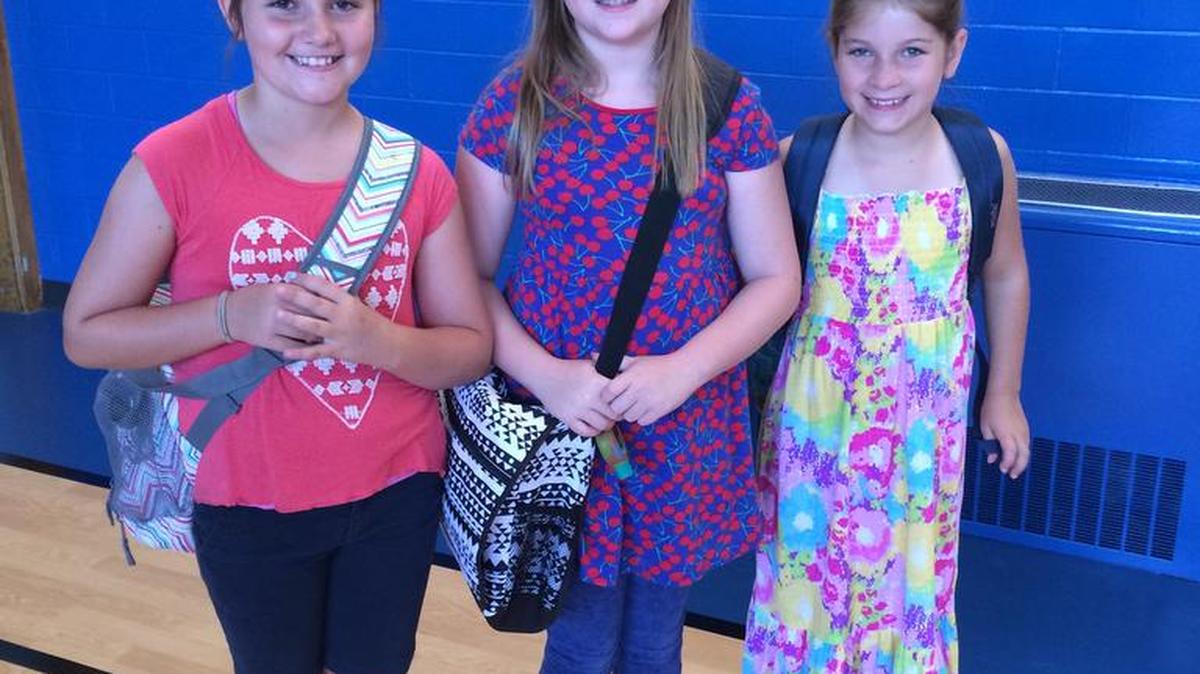 
Blythe Batchelder, Maisey Breedlove and Adori Batchelder attended the backpack blessing at Zion Lutheran Church on Sunday.
