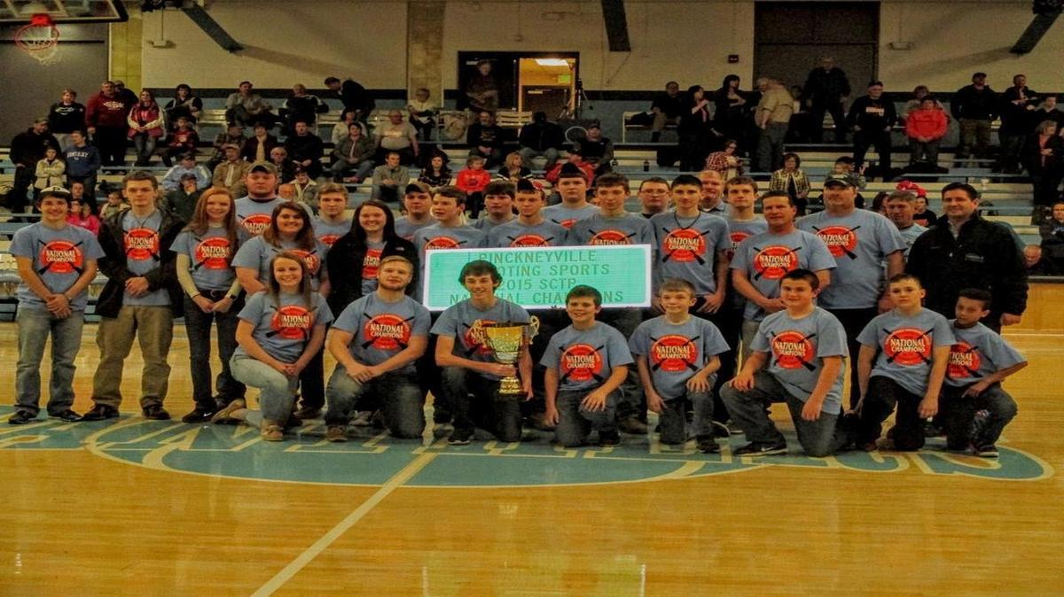 State Rep. Jerry Costello II presented the road sign honoring Pinckneyville Community High School’s Shooting Sports Team to team. Pinckneyville won first place high overall at the Scholastic Clay Target Program Nationals in July 2015.
