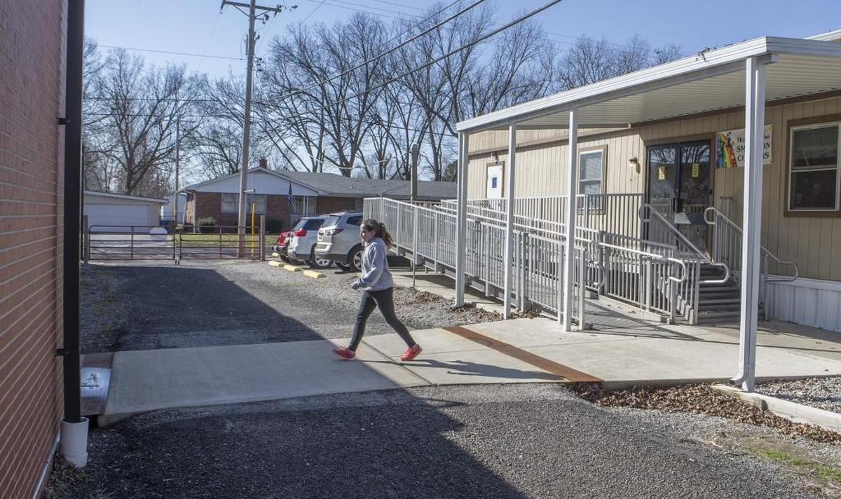 In this 2017 file photo, Smithton fifth-grade students move between a trailer and the school building at Smithton District 130. The district came up with a temporary solution to its space problem caused by growing enrollment back in 2012. It started leasing the trailer to house three fifth-grade classrooms and a shared office for a school social worker and psychologist.