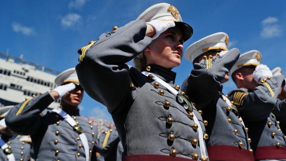 United States Military Academy graduating cadets salute during the playing of the national anthem during commencement ceremonies in May 2017. Nine Hundred and thirty six cadets received their diplomas, most of whom will be commissioned as second lieutenants in the army.