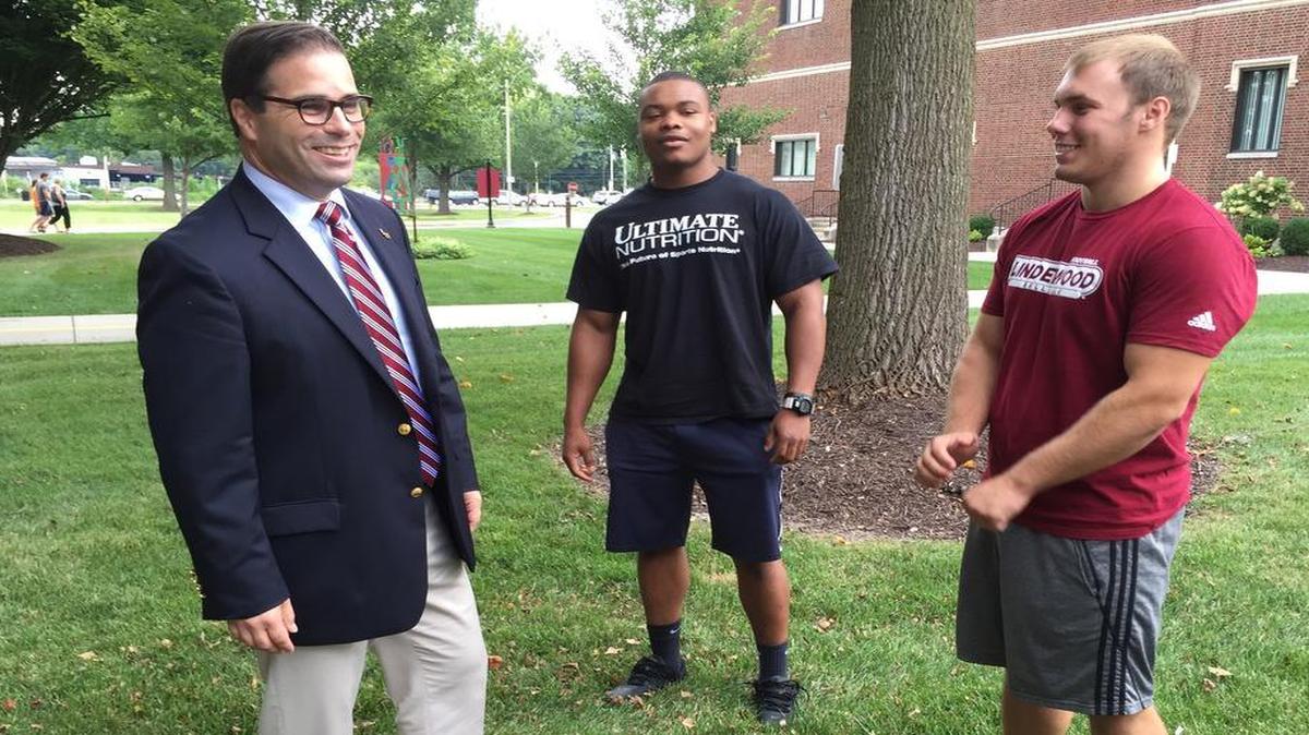 
Lindenwood University-Belleville interim President Brett Barger chats with football players Adrian Williams, of Centralia, and T.J. Onstott of Tuscola, right.
