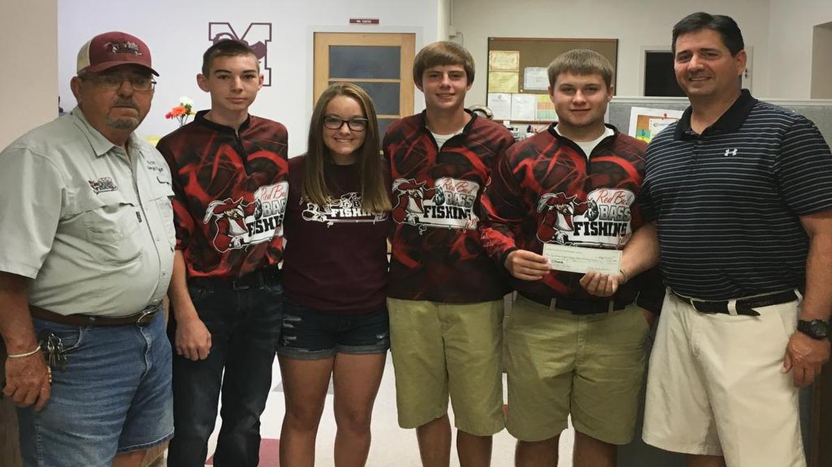 State Rep. Jerry Costello II, right, presents the scholarship check to Red Bud High School bass fishing team coach George Fudge and team members Dawson Reichling, Emmalea Young, Dylan Cathell and Logan Houba.