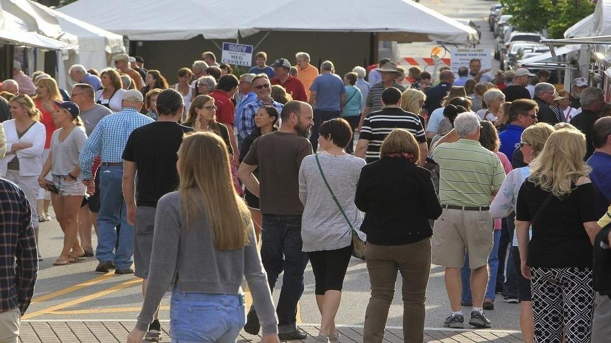 Opening night of the weekend-long Art on the Square in downtown Belleville had large crowds browsing the displays and enjoying the food and musical entertainment.