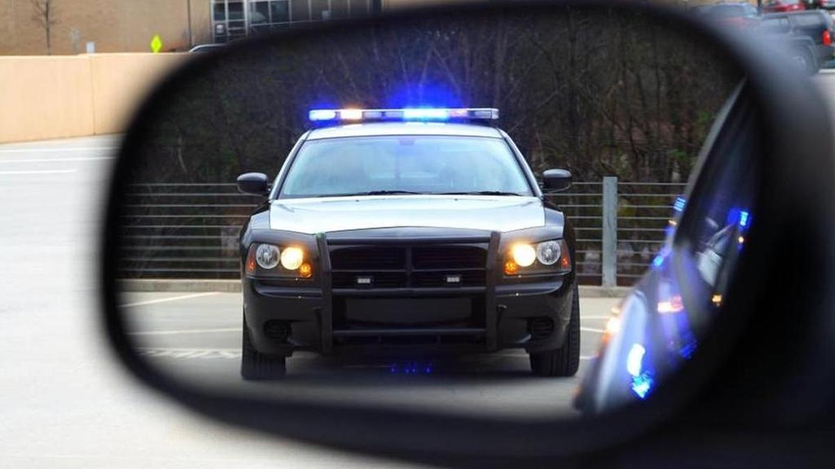 The man, wearing handcuffs, was able to escape from the back of an ambulance after police used a Taser on him following a traffic stop, state police said.