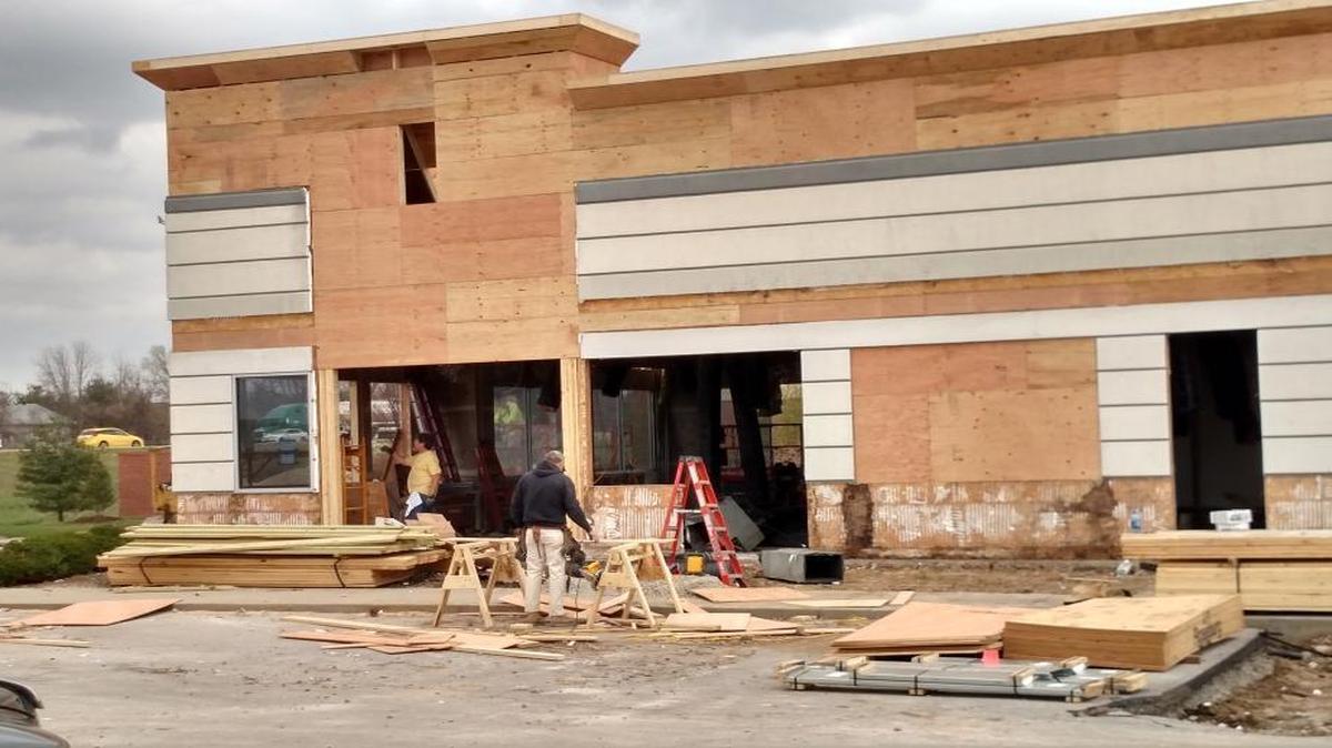 Construction crews renovate the building at 3320 Green Mount Crossing Drive in Shiloh. The building used to house a Johnny Rockets restaurant, but by this summer it will be home to Freddy’s Frozen Custard & Steakburgers.