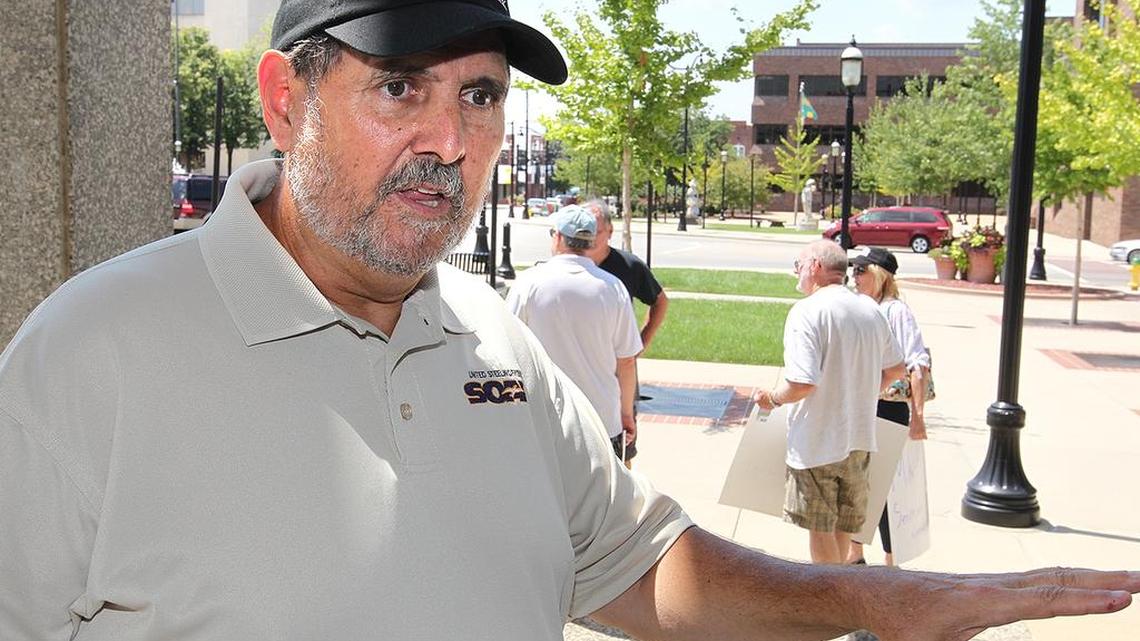 
Jeff Rains of Granite City speaks about his concerns Thursday about Social Security while outside the Bellevillle office of U.S. Rep. Mike Bost.
