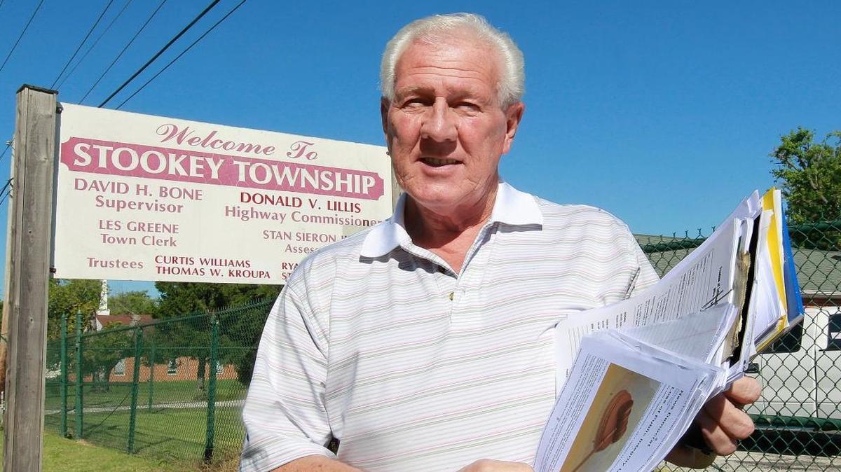 
Dan Weaver was asked to not attend Stookey Township meetings, then was later asked not to “cause trouble” during those meetings. Here, he’s shown outside the township office building.
