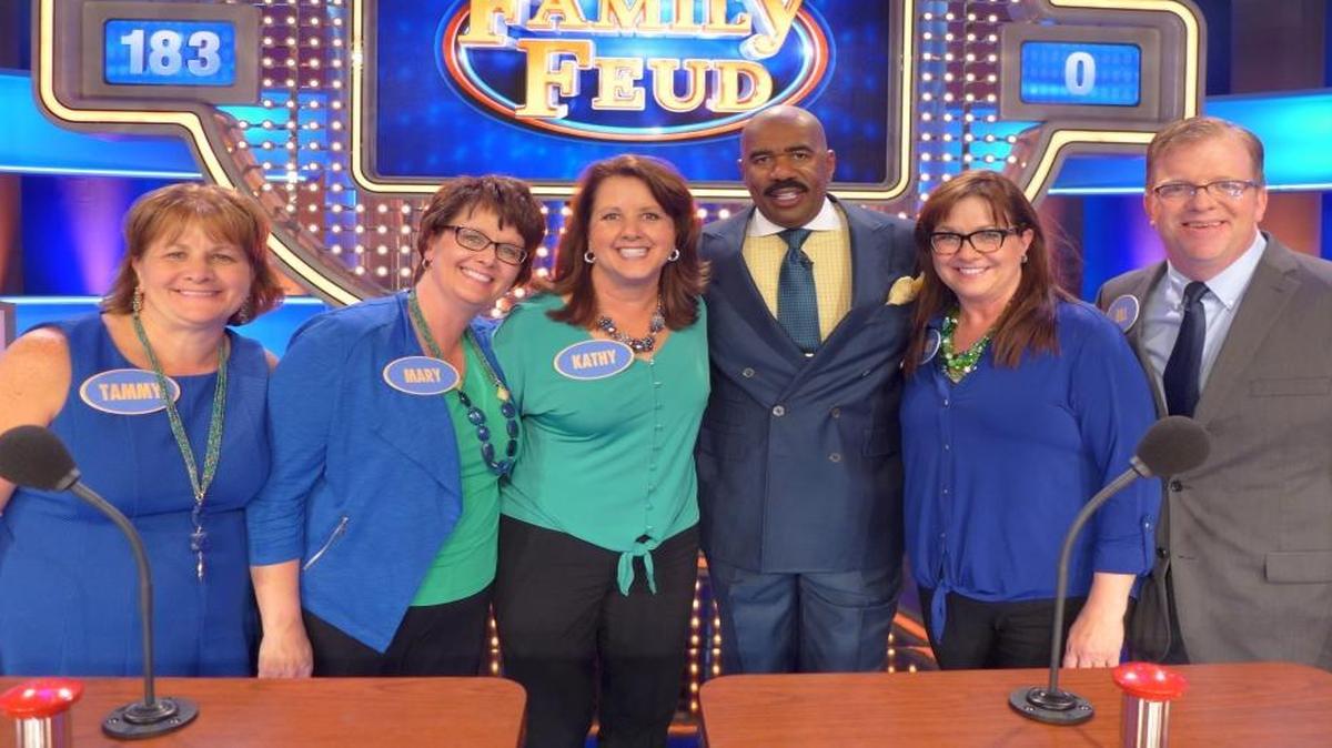 The Shaffer family of Waterloo will appear in an upcoming episode of “Family Feud.” From left, Tammy Slager, Mary Beard, Kathy Warren, show host Steve Harvey, Nancy Quernheim and Bill Wirth pose during a show taping last year in Atlanta.