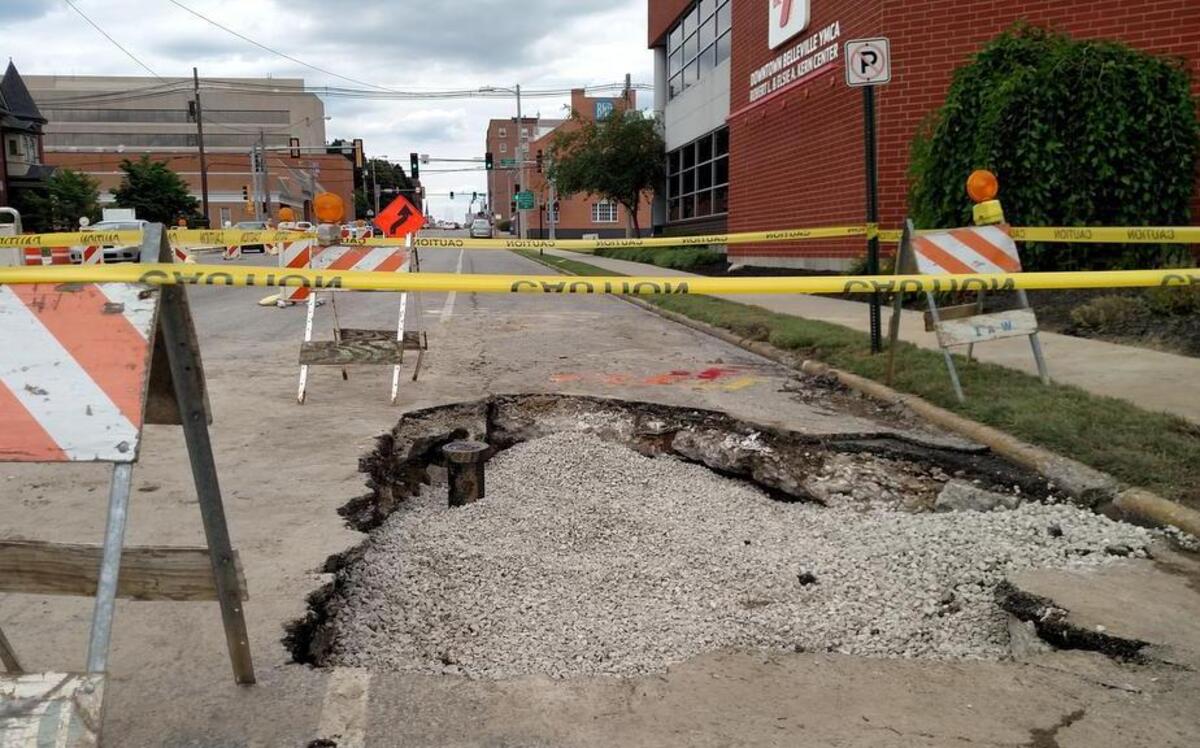 
Barricades and caution tape guard the hole Illinois American Water crews broke into Illinois Street in downtown Belleville to repair a water main break that occurred Tuesday evening. The main was repaired, but five businesses remained under a boil order Thursday.
