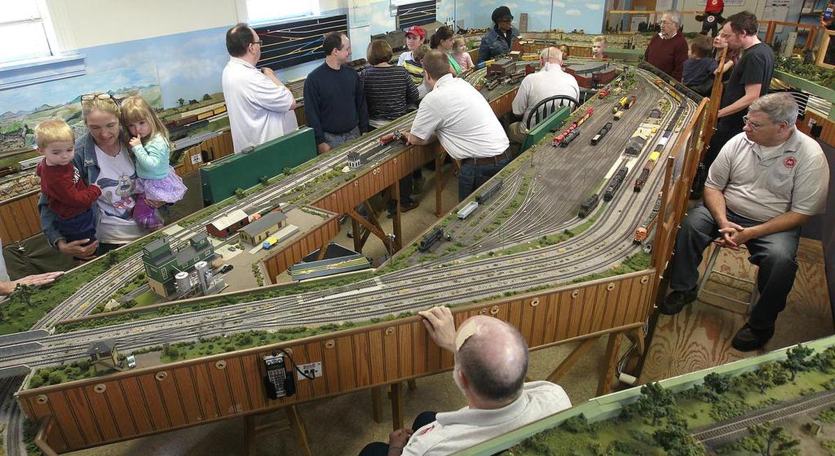An overall view of the elaborate HO gauge model railroad display during a previous open house held by the Metro East Model Railroad Club. The club members are there to answer questions, and oversee train operations, which includes multiple trains running around the tracks simultaneously. The next open house will be held on Friday and Saturday, June 16 and 17, in conjunction with the Glen Carbon Homecoming. For more information about the club, or to join, go to their website at www.trainweb.org/memrc/ or call 254-6596.