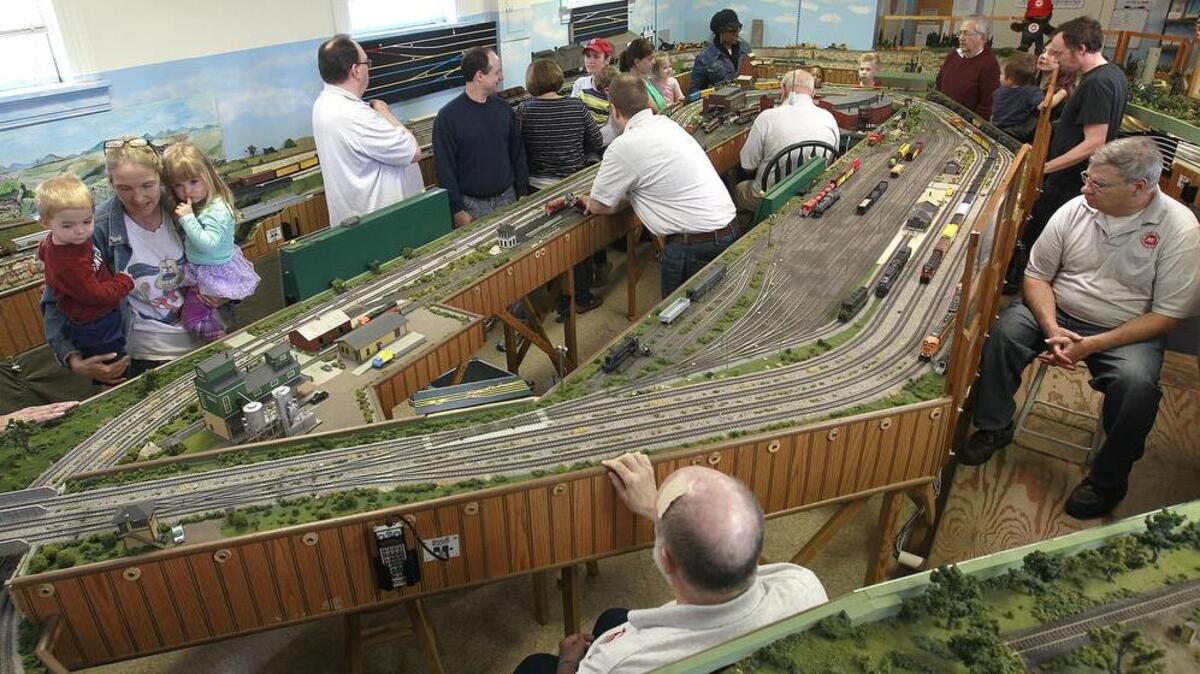 An overall view of the elaborate HO gauge model railroad display during a previous open house held by the Metro East Model Railroad Club. The club members are there to answer questions, and oversee train operations, which includes multiple trains running around the tracks simultaneously. The next open house will be held on Friday and Saturday, June 16 and 17, in conjunction with the Glen Carbon Homecoming. For more information about the club, or to join, go to their website at www.trainweb.org/memrc/ or call 254-6596.