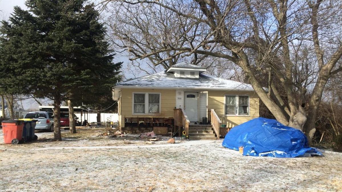A home in the 900 block of Nichols Street in Collinsville caught fire Sunday morning, sending one resident to the hospital. Damage to the home’s basement can be seen from the street.