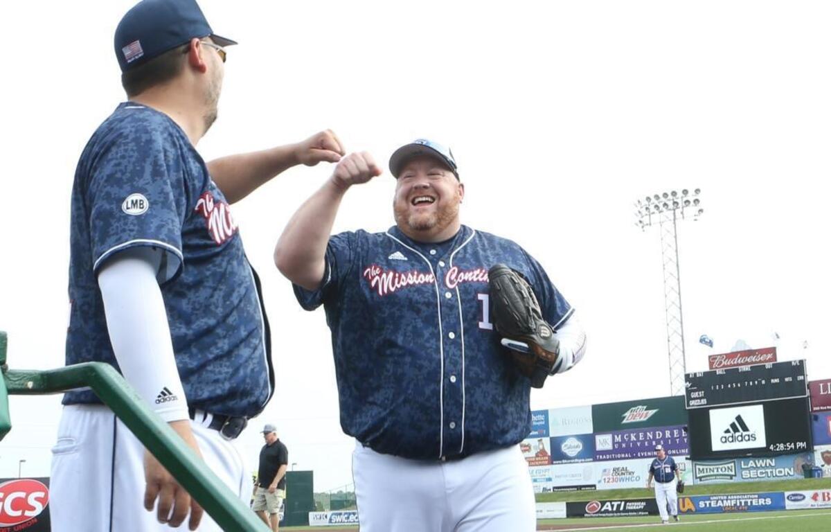 J.C. Rudden gets a fist bump from a Mission Continues Blue teammate as he exits the field. Players ranging in age from 18 to 62 are trying to play a record 74 uninterrupted hours, surpassing their own record of 70 hours, nine minutes, 24 seconds in 2015. The game should end sometime around 10 A.M. Monday. This is the the group’s ninth attempt at the record and is being made in support of The Mission Continues, a nonprofit organization that helps veterans adjust to life back home to find purpose through community impact.