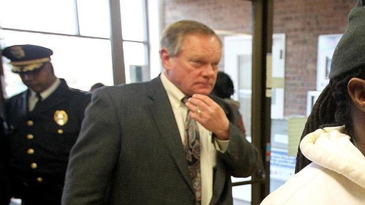 In this file photo, attorney Rick Roustio walks into the St. Clair County Courthouse in Belleville.